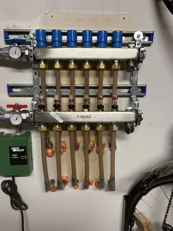 Plumber performing Leak Detection at a residential property in Nibley